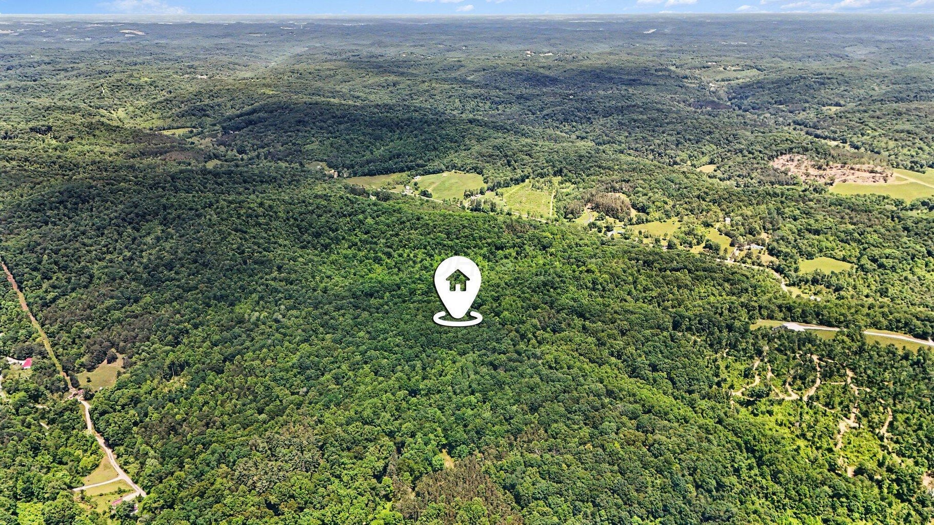 Aerial view of the wooded acreage at 15005 Jack Run Road, Rockbridge, Ohio