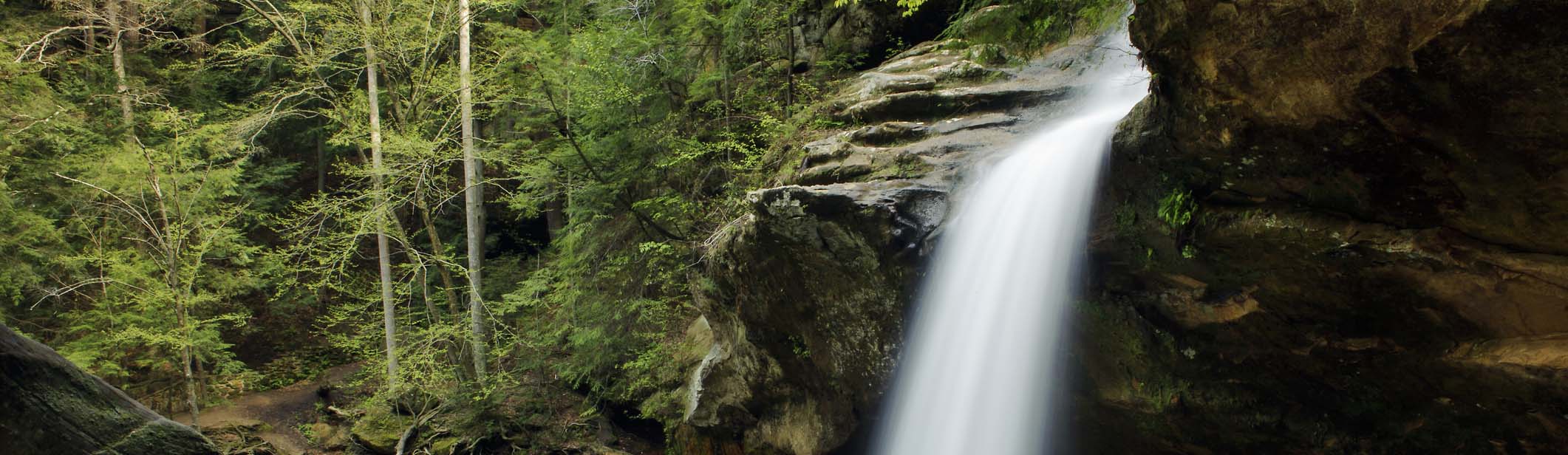 Waterfall over sandstone cliffs in Hocking Hills State Park, Ohio