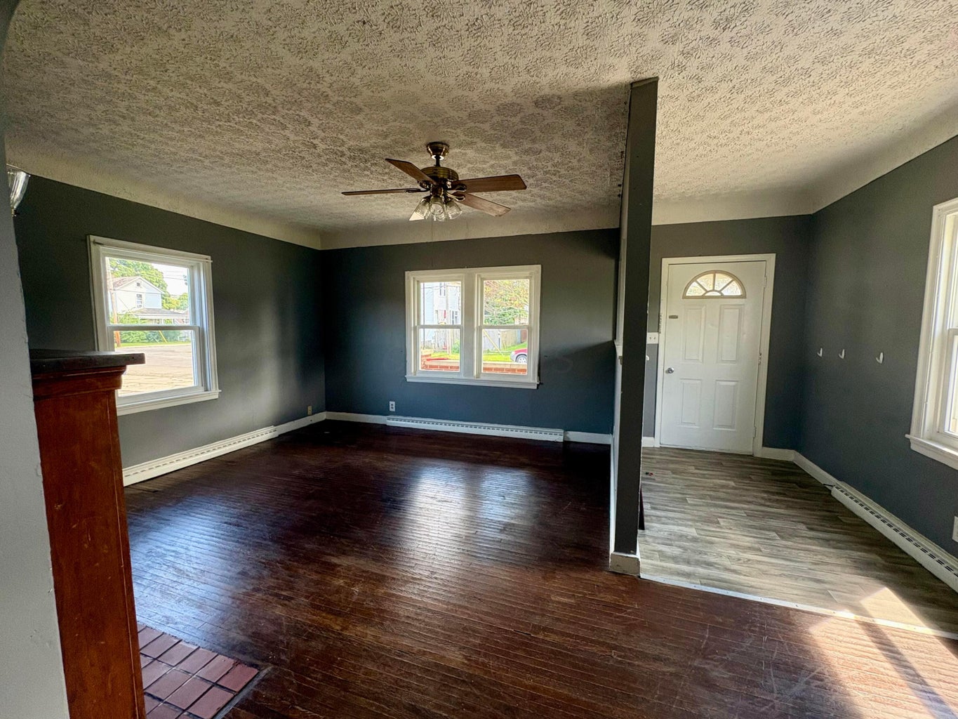 Living room at 425 Forest Rose Avenue, Lancaster, Ohio, with hardwood floors and a ceiling fan
